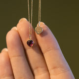 XO Rhodolite Garnet Charm